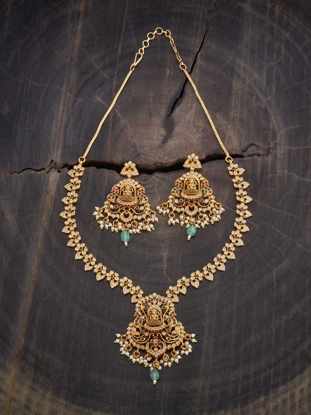 Kushal's Fashion Jewellery Gold-Plated Stone Studded Antique Necklace and Earrings
Kushal's Fashion Jewellery Gold-Plated Stone Studded Antique Necklace and Earrings