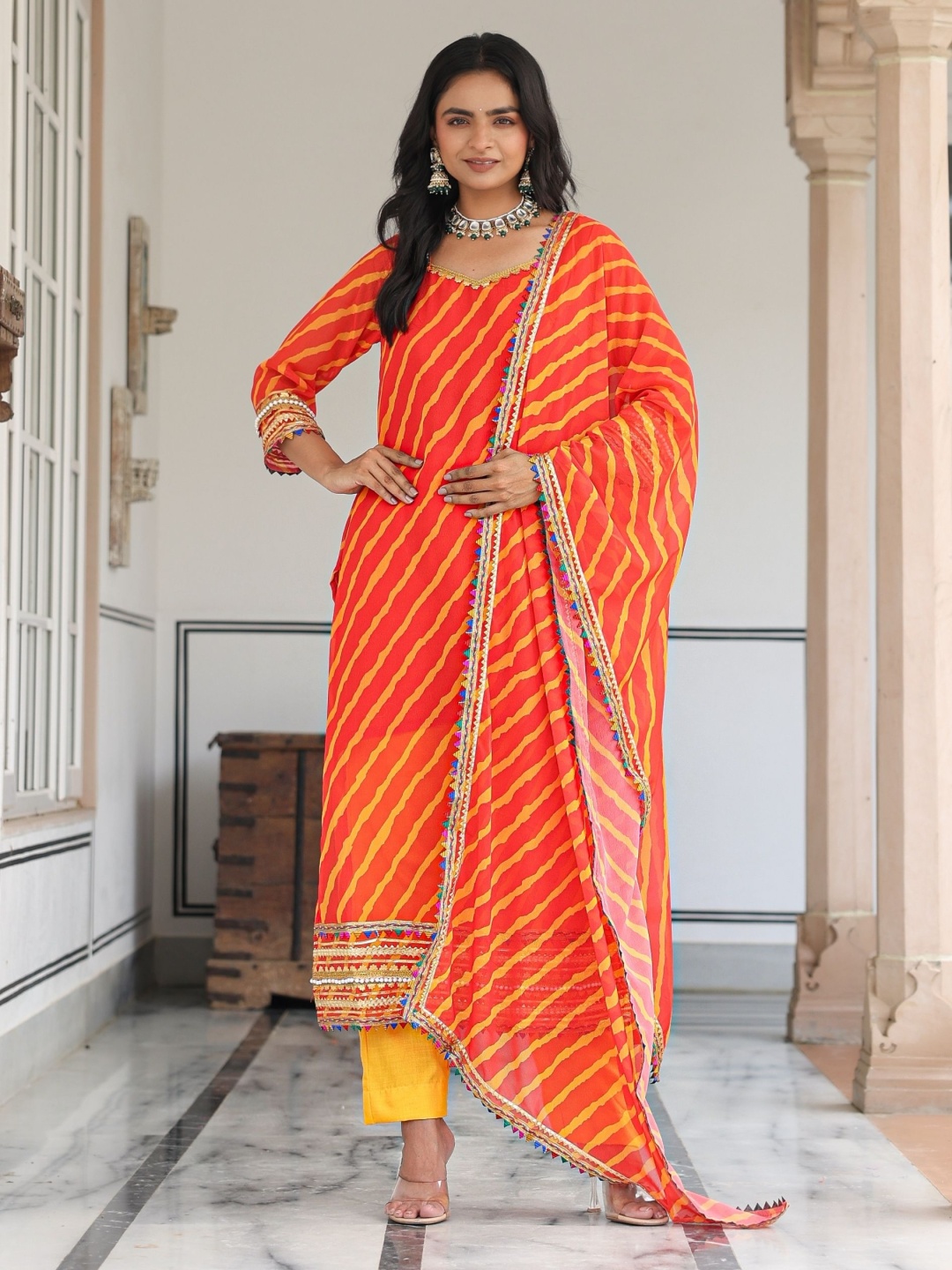 ASHEERA Women Leheriya Printed Regular Gotta Patti Kurta with Trousers & With Dupatta, Yellow
ASHEERA Women Leheriya Printed Regular Gotta Patti Kurta with Trousers & With Dupatta, Yellow