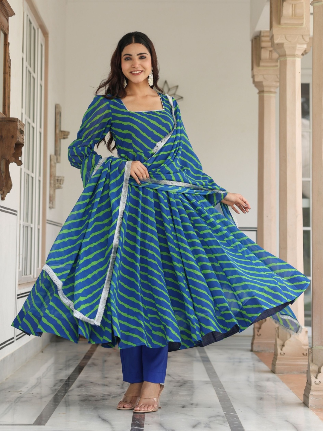 ASHEERA Women Leheriya Printed High Slit Gotta Patti Kurta with Trousers & With Dupatta, Blue
ASHEERA Women Leheriya Printed High Slit Gotta Patti Kurta with Trousers & With Dupatta, Blue