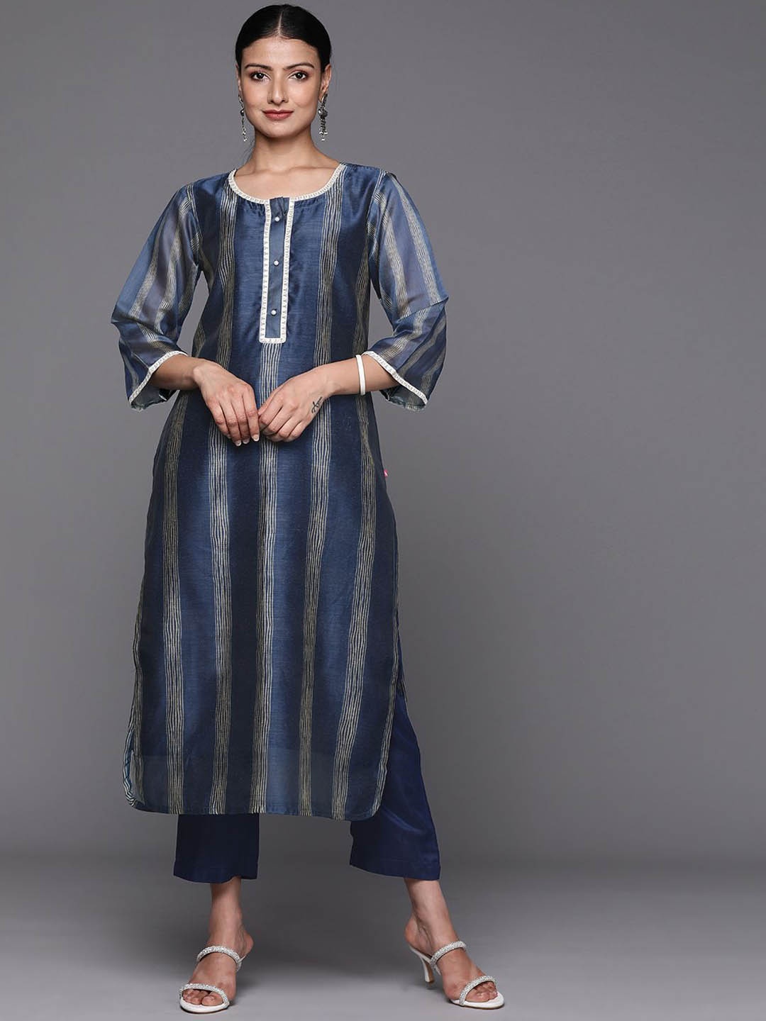 KALINI Women Striped Regular Sequinned Chanderi Silk Kurta with Trousers, Navy blue
KALINI Women Striped Regular Sequinned Chanderi Silk Kurta with Trousers, Navy blue