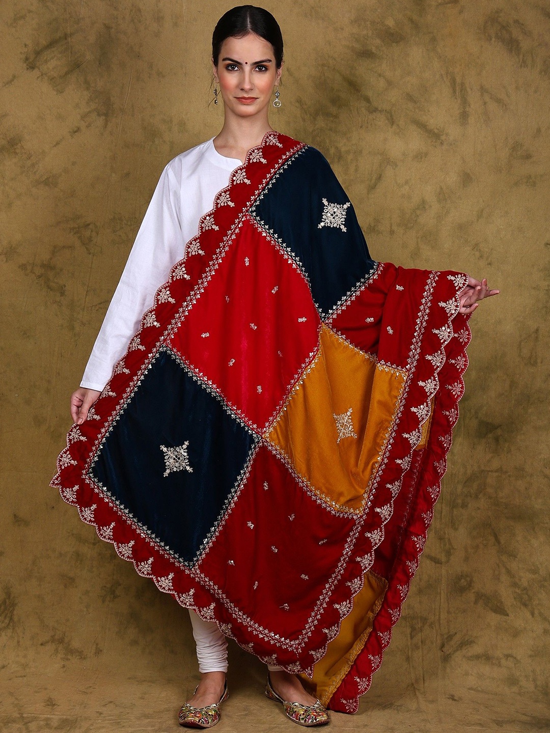 Exotic India Velvet Multicolor Patchwork Sequins Embroidered Dupatta with Scalloped Border, Red
Exotic India Velvet Multicolor Patchwork Sequins Embroidered Dupatta with Scalloped Border, Red