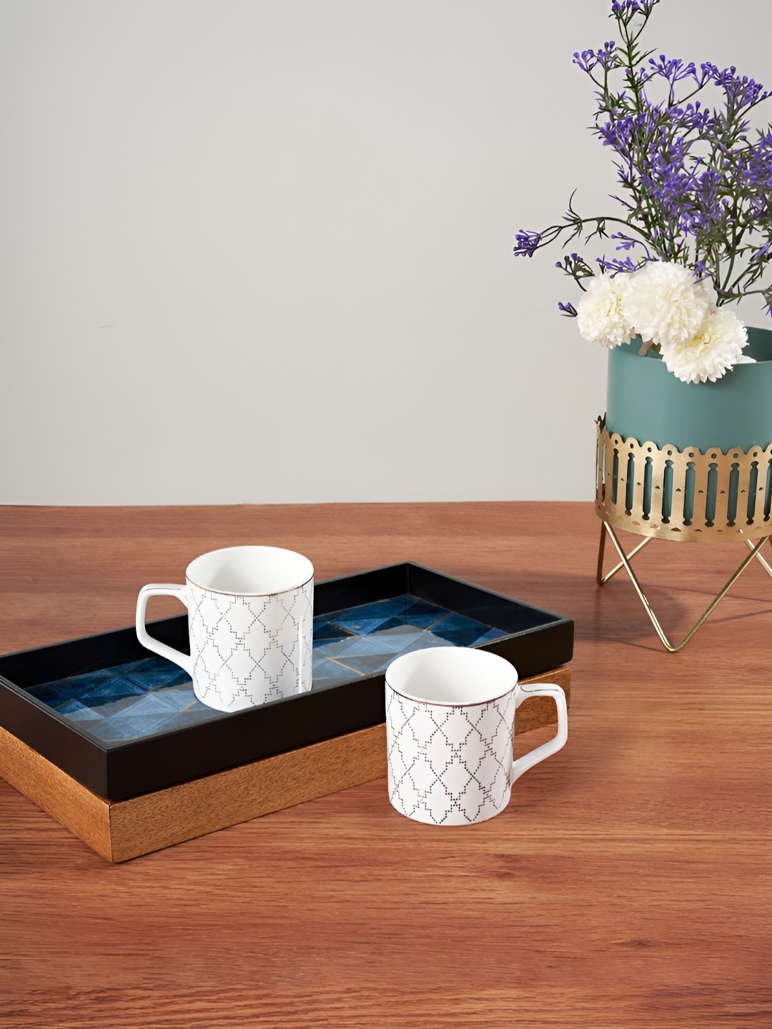 Living scapes by Pantaloons Gold-Toned & White Printed Bone China Matte Mugs Set of Cups and Mugs
Living scapes by Pantaloons Gold-Toned & White Printed Bone China Matte Mugs Set of Cups and Mugs