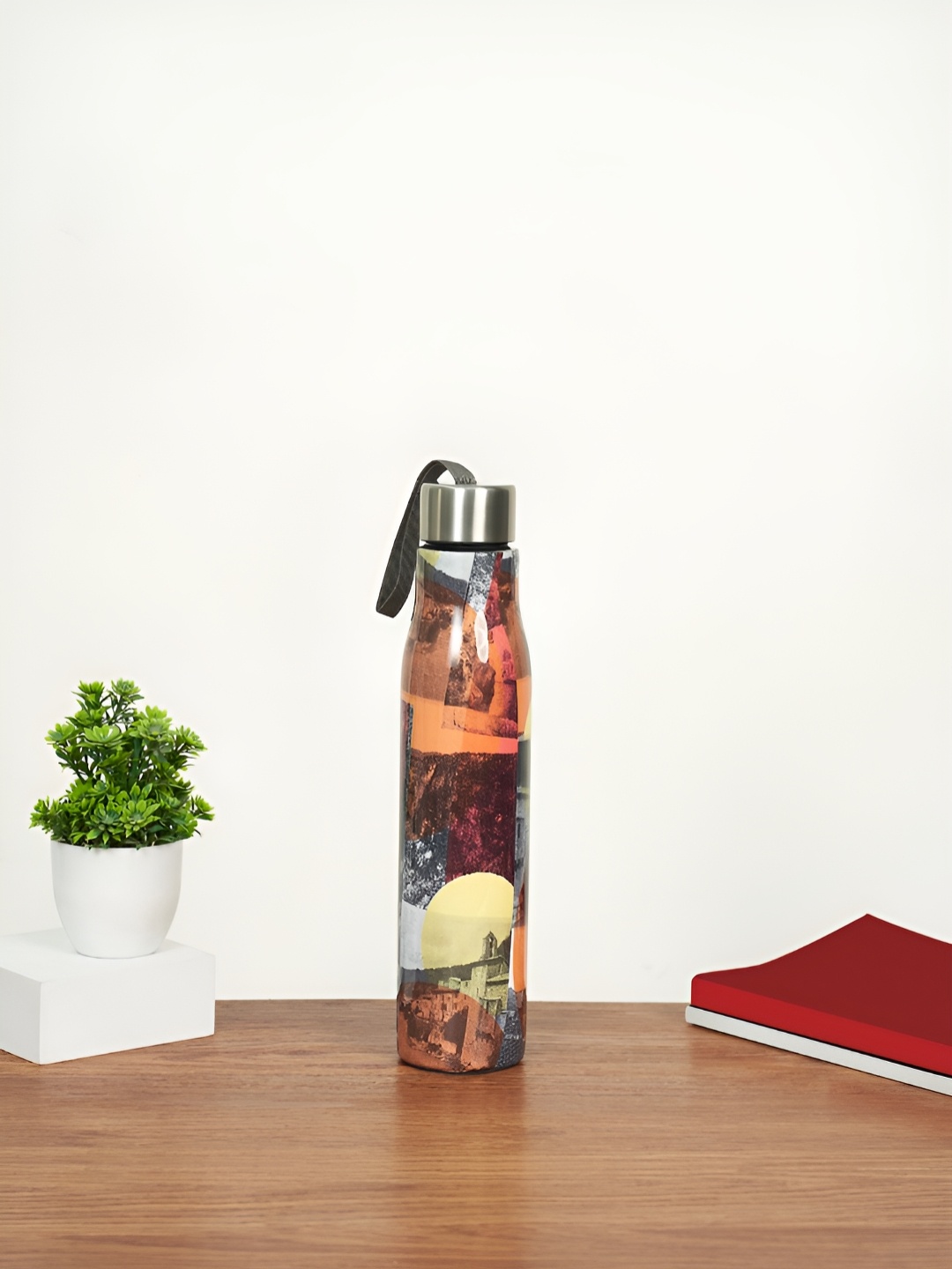 Living scapes by Pantaloons Orange & Yellow Single Stainless Steel Printed Water Bottle
Living scapes by Pantaloons Orange & Yellow Single Stainless Steel Printed Water Bottle