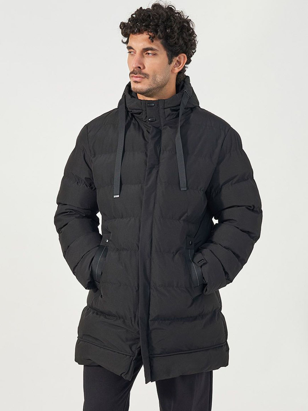 Styli Men Longline Hooded Puffer Parka Jacket with Drawstring Tape Detail, Black
Styli Men Longline Hooded Puffer Parka Jacket with Drawstring Tape Detail, Black