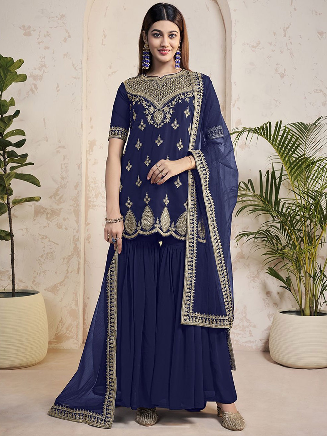 Inddus Women Ethnic Motifs Embroidered Regular Sequinned Kurta with Sharara & With Dupatta, Navy blue
Inddus Women Ethnic Motifs Embroidered Regular Sequinned Kurta with Sharara & With Dupatta, Navy blue