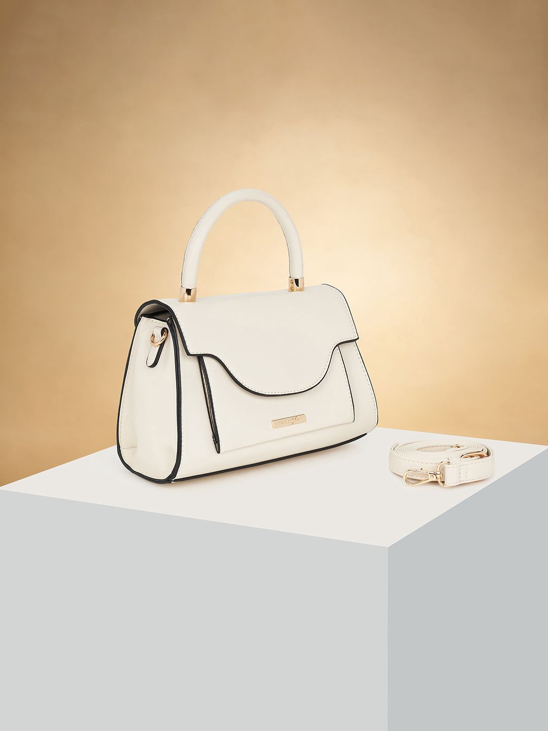 Forever Glam by Pantaloons Colourblocked PU Structured Shoulder Bag with Applique, Off white
Forever Glam by Pantaloons Colourblocked PU Structured Shoulder Bag with Applique, Off white