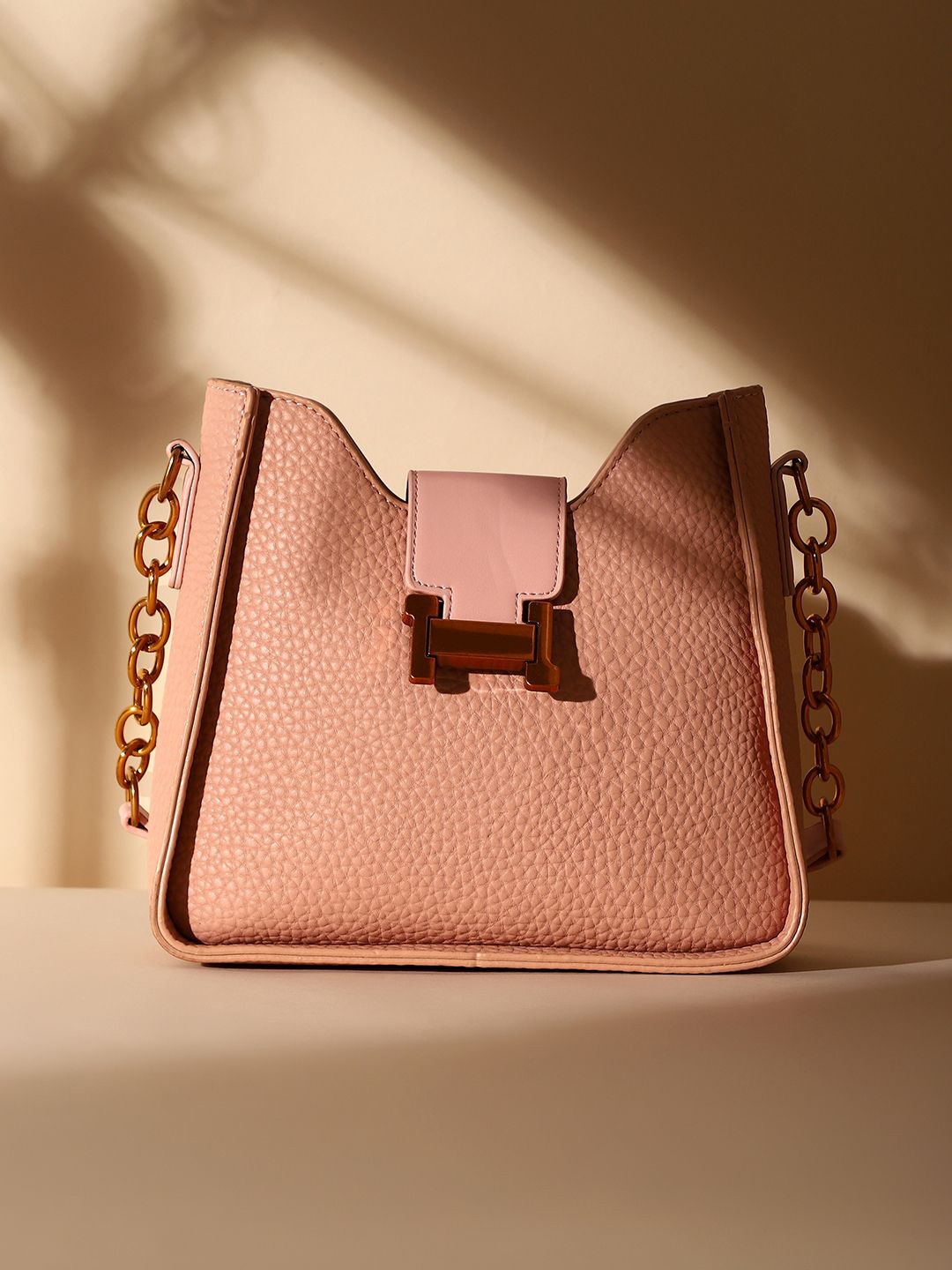 HAUTE SAUCE by Campus Sutra Leather Structured Shoulder Bag with Tasselled, Pink
HAUTE SAUCE by Campus Sutra Leather Structured Shoulder Bag with Tasselled, Pink