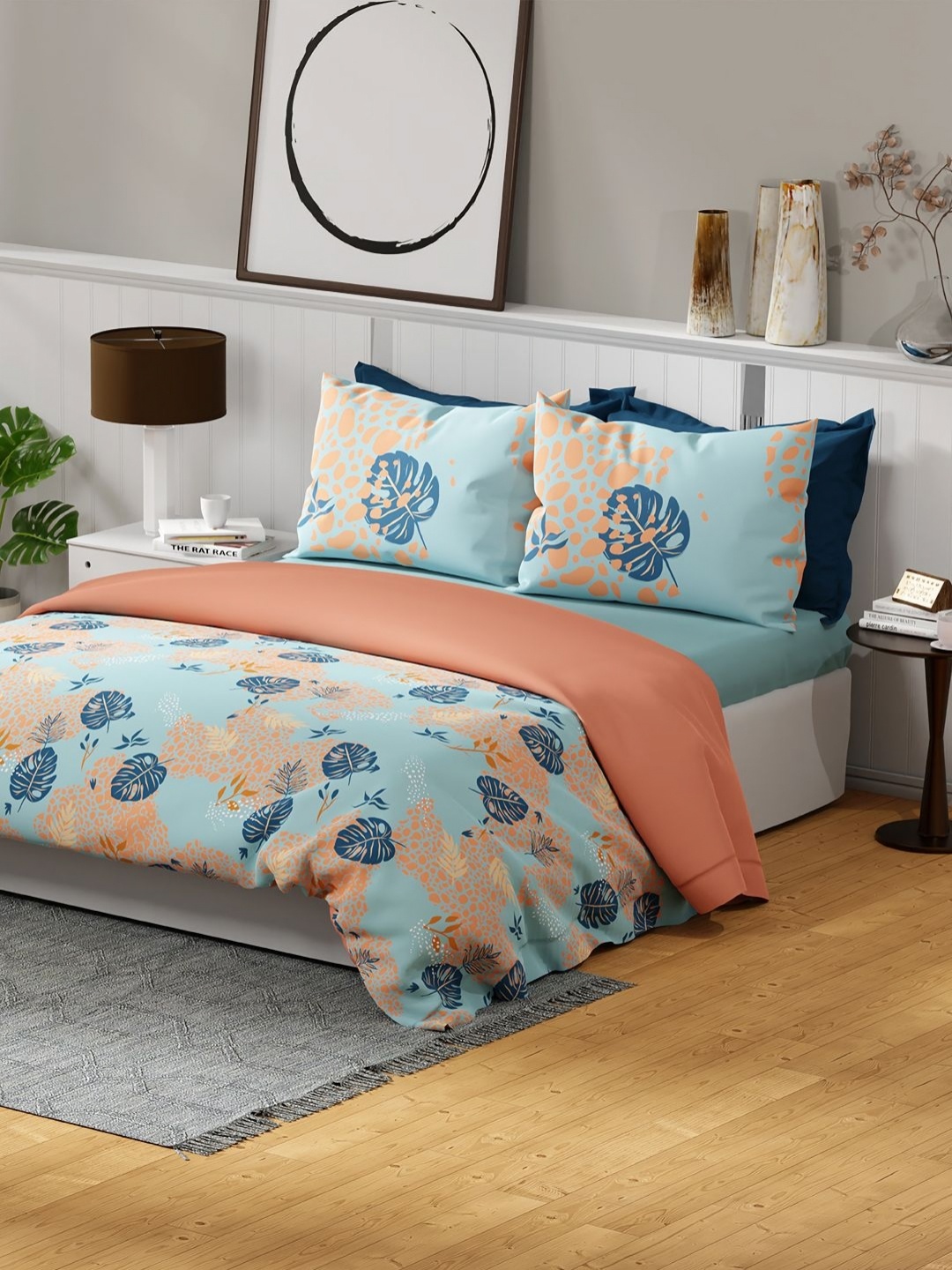 United Colors of Benetton Blue & Peach-Coloured Floral 144 TC Queen Bedsheet with 2 Pillow Covers
United Colors of Benetton Blue & Peach-Coloured Floral 144 TC Queen Bedsheet with 2 Pillow Covers