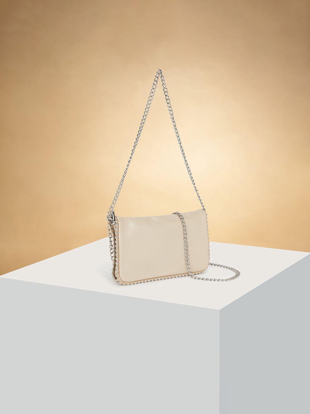 Forever Glam by Pantaloons Colourblocked PU Oversized Structured Sling Bag with Bow Detail, Off white
Forever Glam by Pantaloons Colourblocked PU Oversized Structured Sling Bag with Bow Detail, Off white