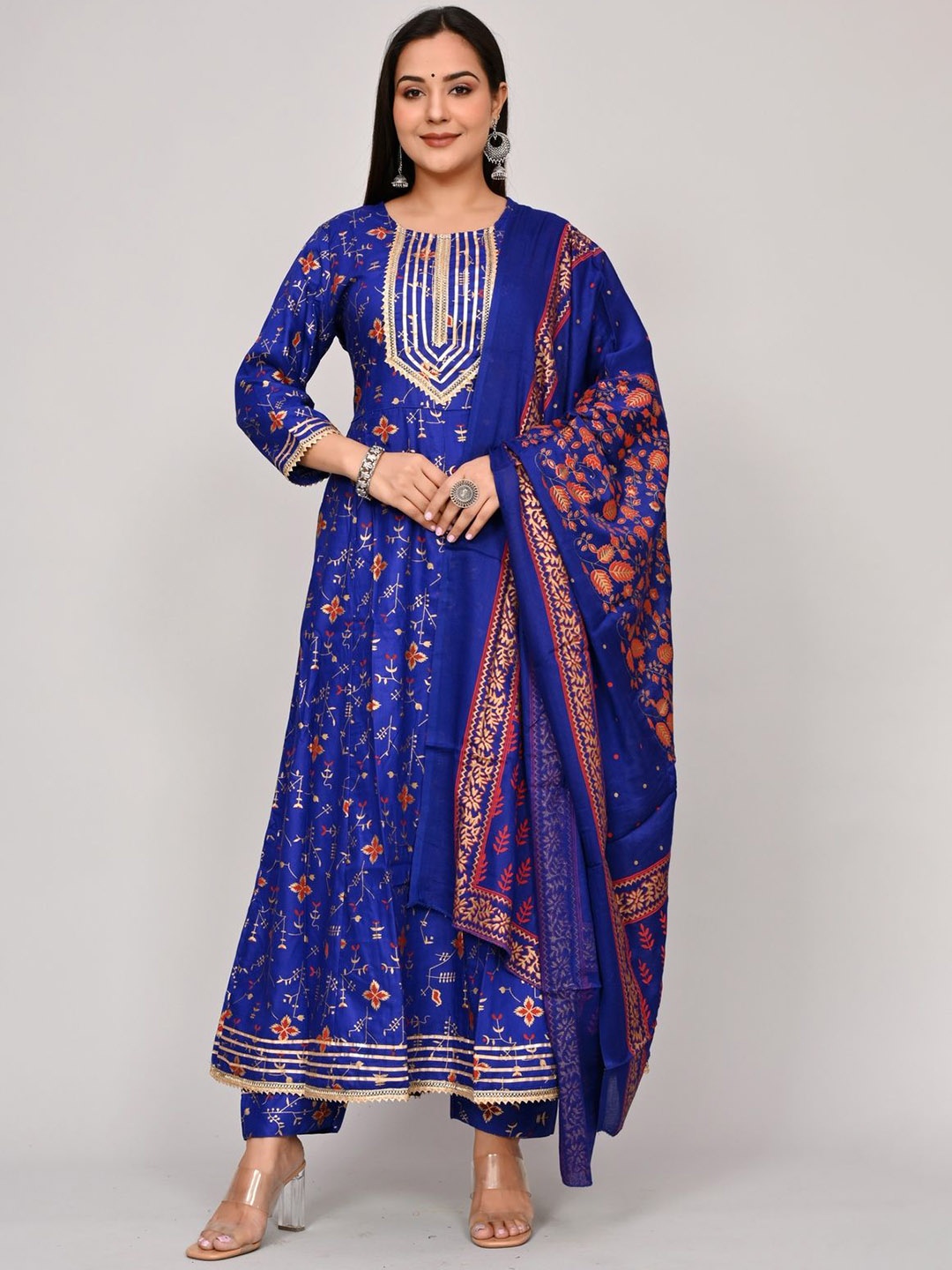 KALINI Women Floral Printed Regular Gotta Patti Kurta with Trousers & With Dupatta, Blue
KALINI Women Floral Printed Regular Gotta Patti Kurta with Trousers & With Dupatta, Blue
