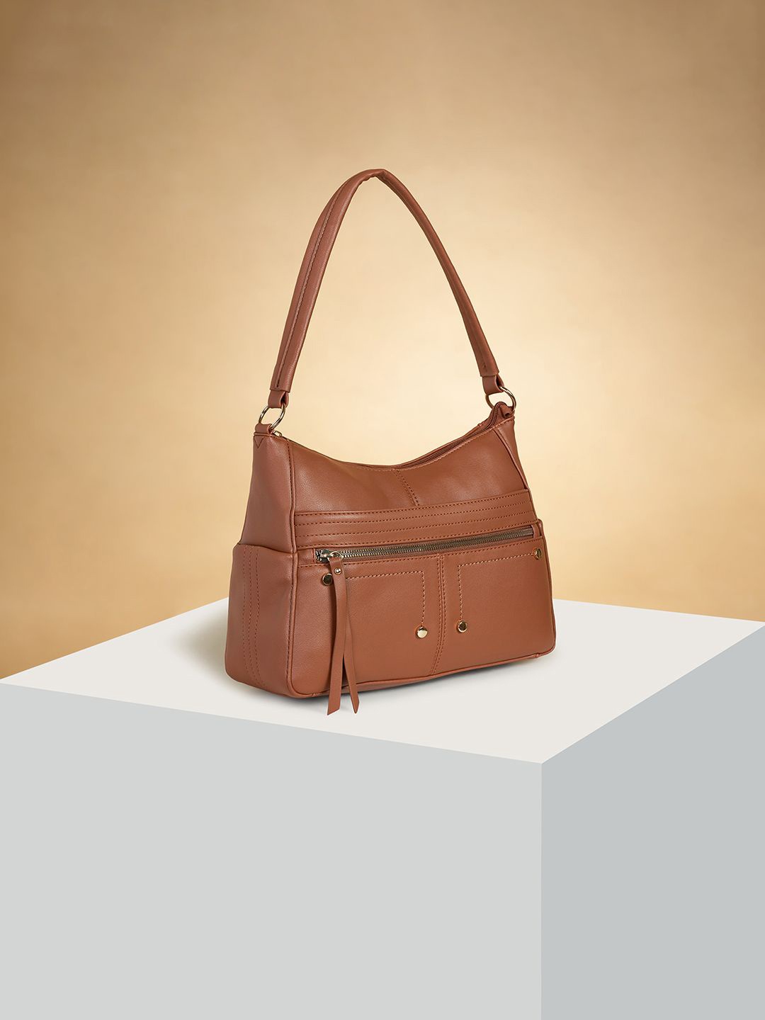 Forever Glam by Pantaloons Colourblocked PU Oversized Structured Shoulder Bag with Tasselled, Tan
Forever Glam by Pantaloons Colourblocked PU Oversized Structured Shoulder Bag with Tasselled, Tan
