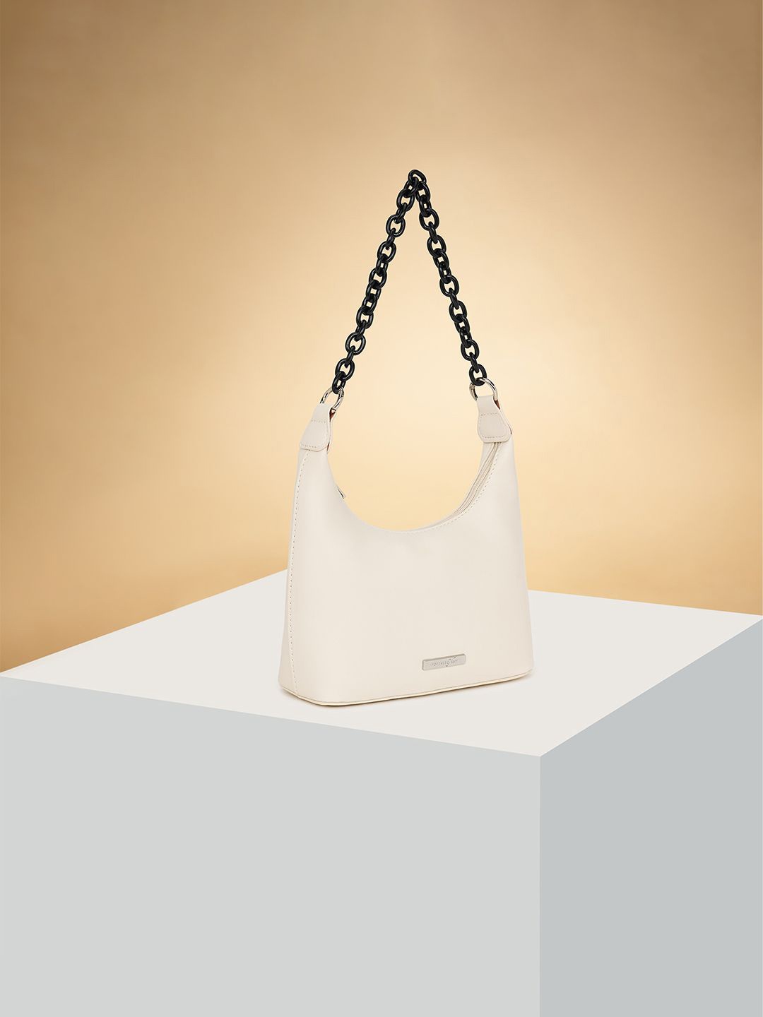 Forever Glam by Pantaloons Colourblocked PU Structured Shoulder Bag with Bow Detail, Off white
Forever Glam by Pantaloons Colourblocked PU Structured Shoulder Bag with Bow Detail, Off white