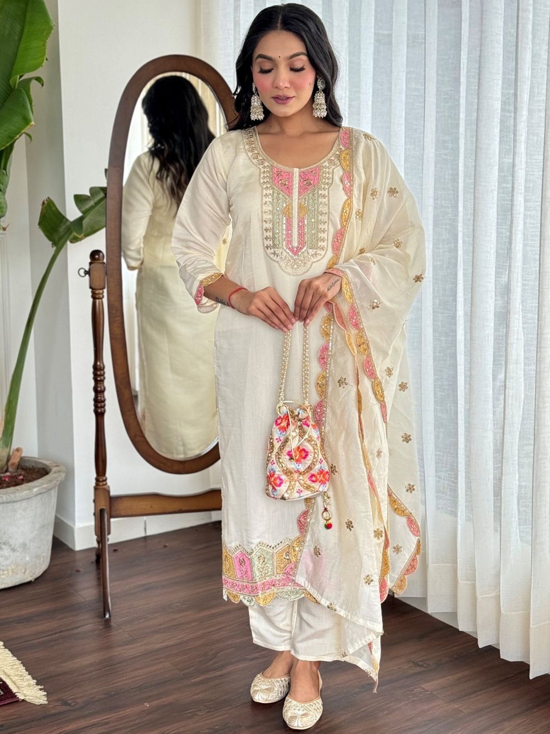 KALINI Floral Embroidered Straight Sequinned Chanderi Silk Kurta with Trousers & Dupatta, Off white
KALINI Floral Embroidered Straight Sequinned Chanderi Silk Kurta with Trousers & Dupatta, Off white