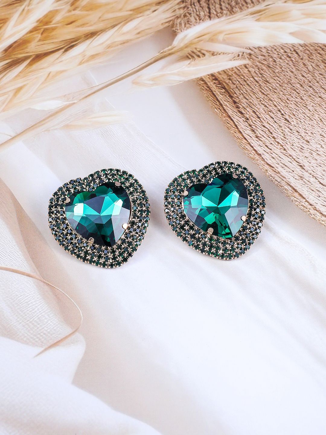 Rubans 18k Gold-Plated Green Crystals Studded Heart Shaped Studs With Black Stone Border
Rubans 18k Gold-Plated Green Crystals Studded Heart Shaped Studs With Black Stone Border