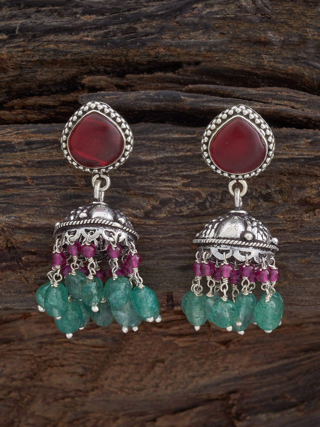 Kushal's Fashion Jewellery Silver-Plated Ruby Stone Studded & Beaded Dome Shaped Jhumkas
Kushal's Fashion Jewellery Silver-Plated Ruby Stone Studded & Beaded Dome Shaped Jhumkas