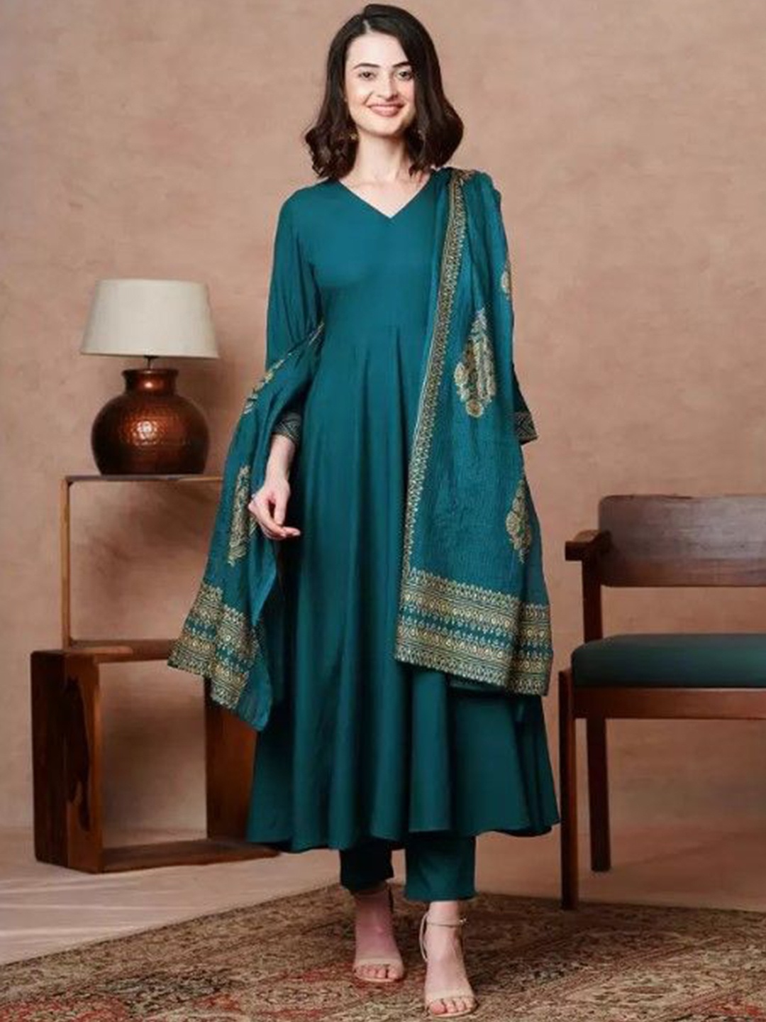 TITANIUM SILK INDUSTRIES PVT. LTD. V-Neck Anarkali Kurta with Trousers & Dupatta, Blue
TITANIUM SILK INDUSTRIES PVT. LTD. V-Neck Anarkali Kurta with Trousers & Dupatta, Blue
