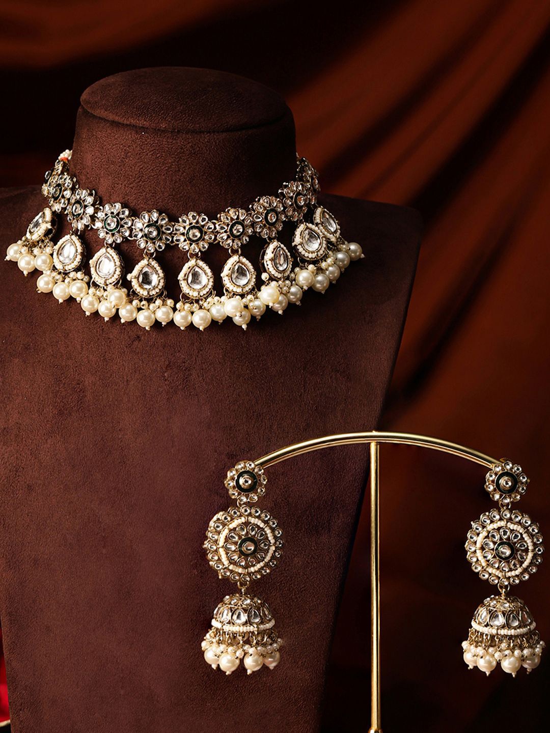 Priyaasi Gold-Plated Floral Kundan Studded & Pearls Beaded Sequence Chocker Jewellery Set
Priyaasi Gold-Plated Floral Kundan Studded & Pearls Beaded Sequence Chocker Jewellery Set