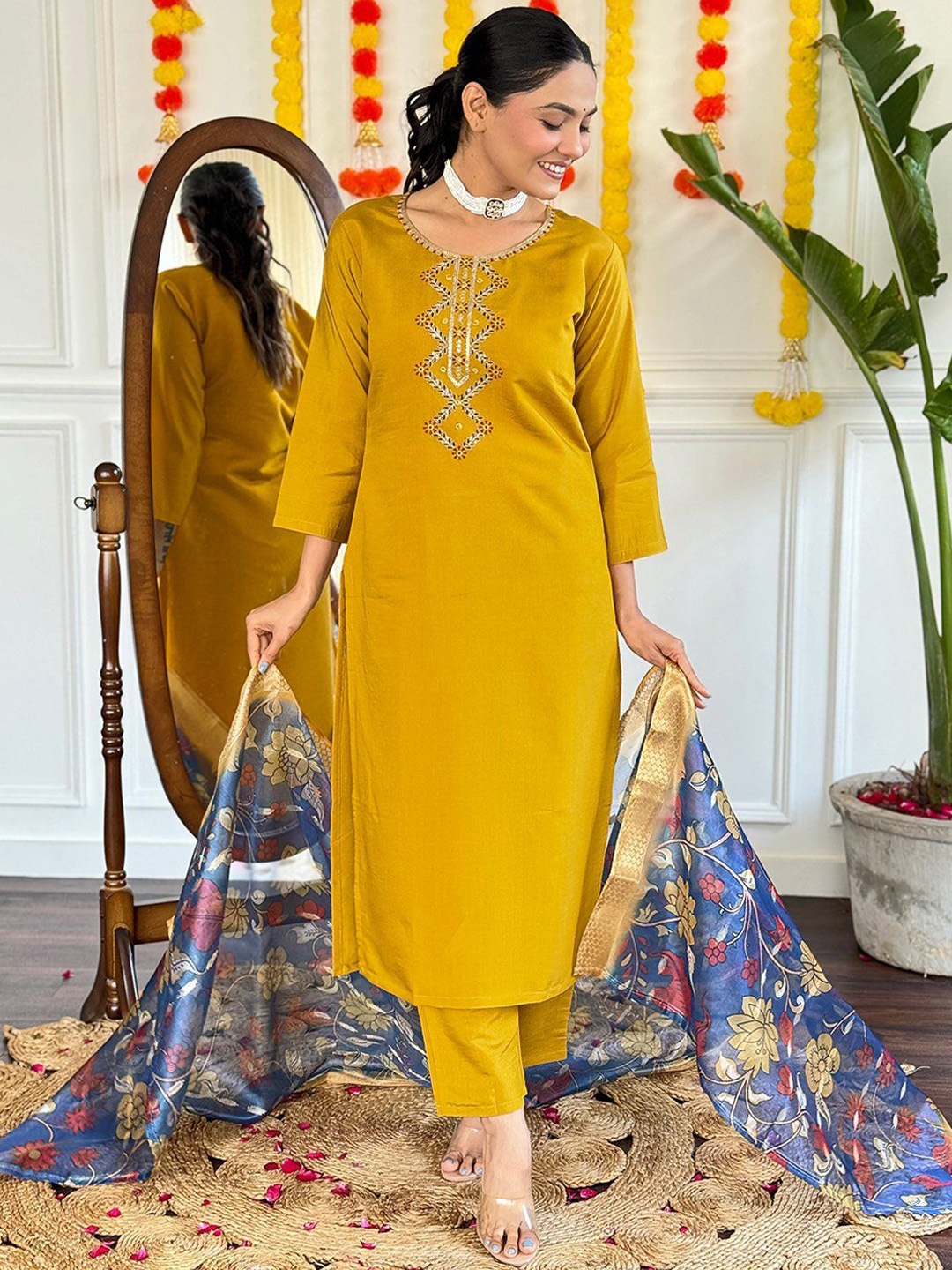KALINI Floral Yoke Design Thread Work Chanderi Silk Straight Kurta with Trouser & Dupatta, Mustard
KALINI Floral Yoke Design Thread Work Chanderi Silk Straight Kurta with Trouser & Dupatta, Mustard