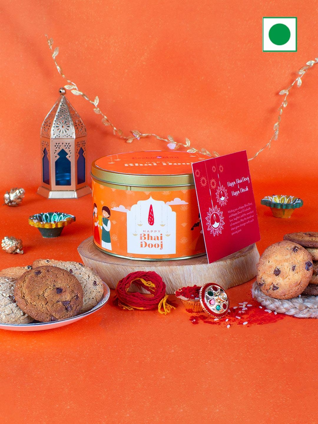Cookieman Bhai Dooj Gift Tin with Cookies, Moli Thread, Roli Tika Chawal, Greeting Card, Orange
Cookieman Bhai Dooj Gift Tin with Cookies, Moli Thread, Roli Tika Chawal, Greeting Card, Orange