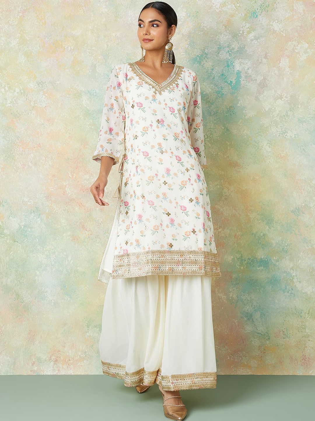 Melange by Lifestyle Floral Embroidered Thread Work Kurta with Sharara & Dupatta, Off white
Melange by Lifestyle Floral Embroidered Thread Work Kurta with Sharara & Dupatta, Off white