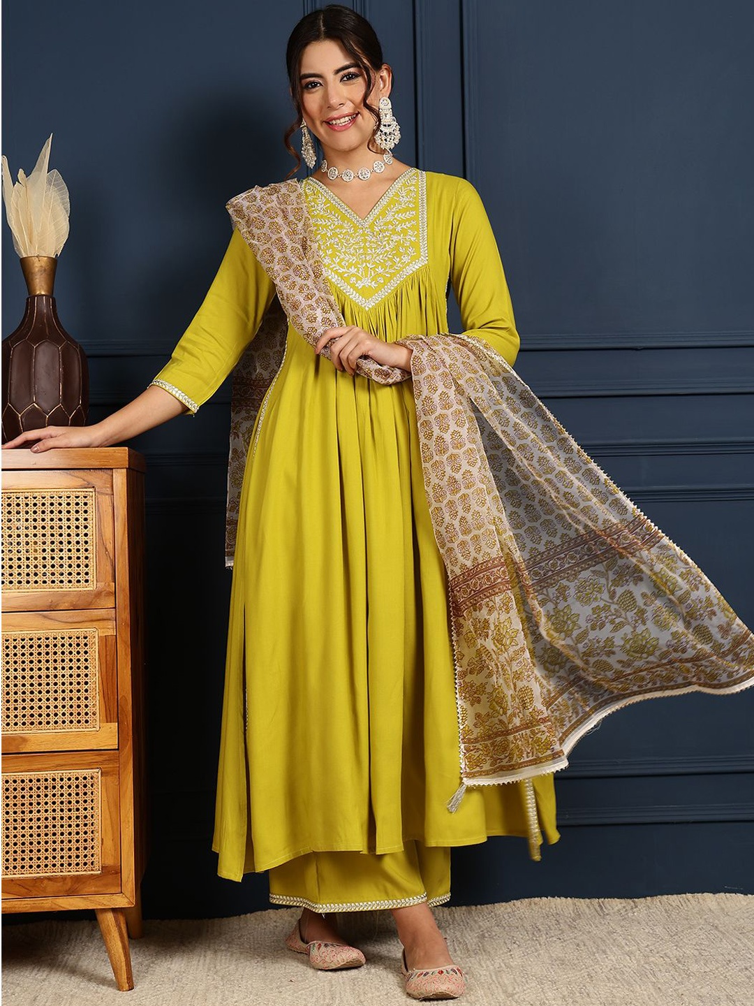 KIMAYRA Floral Yoke Design Thread Work Pleated Straight Kurta with Palazzos & Dupatta, Lime green
KIMAYRA Floral Yoke Design Thread Work Pleated Straight Kurta with Palazzos & Dupatta, Lime green