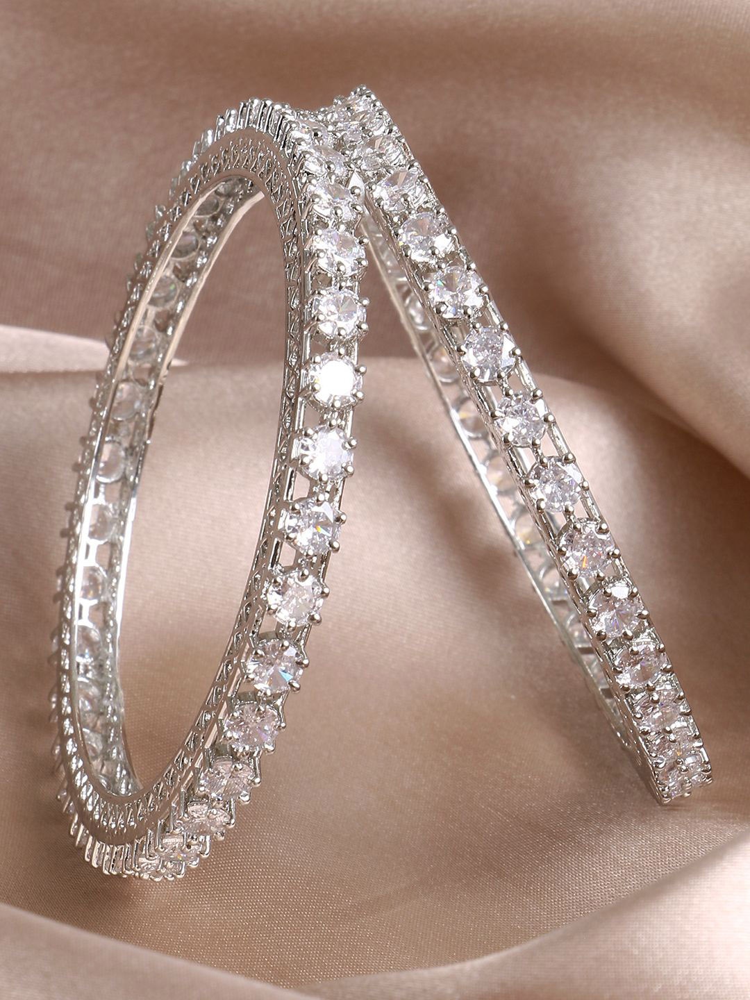 Adwitiya Collection Set Of 2 Rhodium-Plated American Diamond-Studded Bangles, Silver
Adwitiya Collection Set Of 2 Rhodium-Plated American Diamond-Studded Bangles, Silver