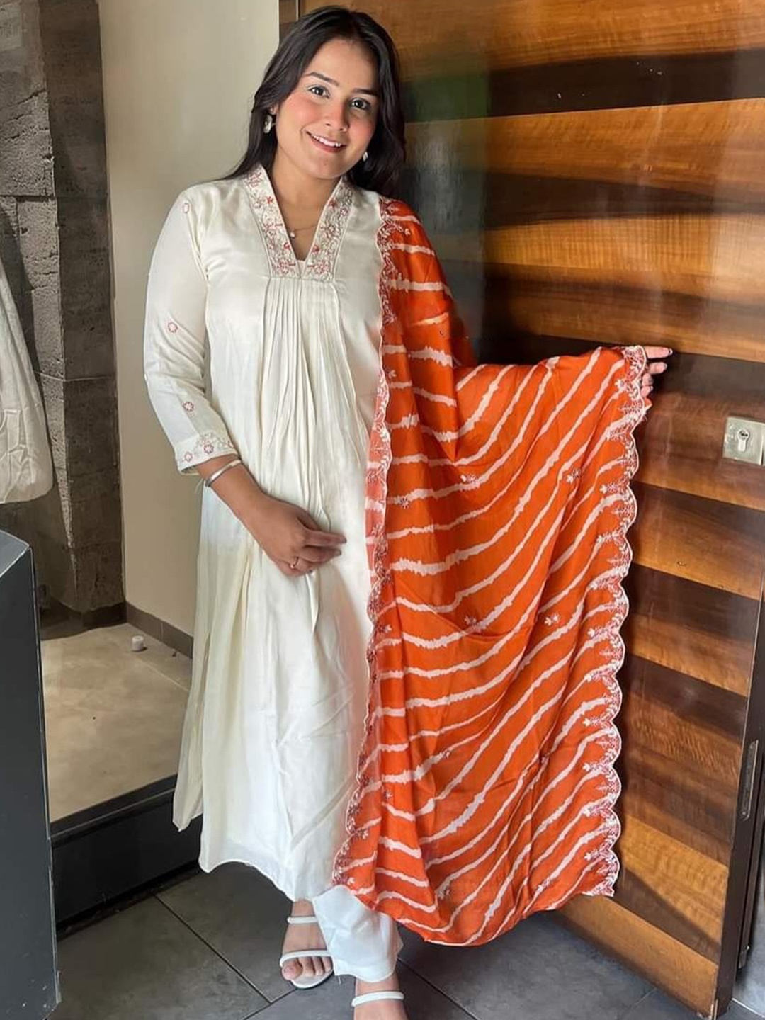 KALINI Embroidered Pleated Chanderi Silk A-Line Kurta with Trouser & Dupatta, Off white
KALINI Embroidered Pleated Chanderi Silk A-Line Kurta with Trouser & Dupatta, Off white