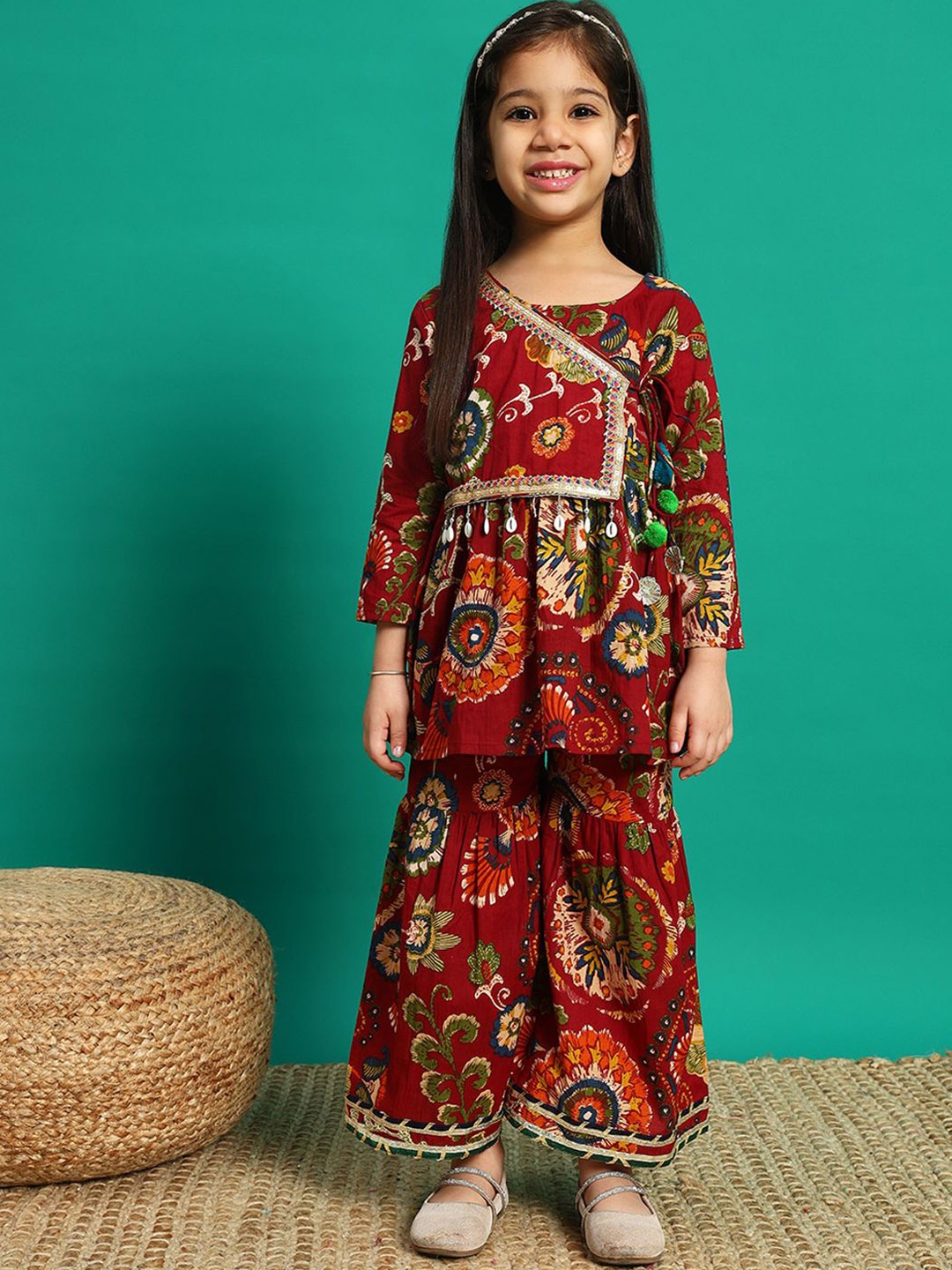 Readiprint Girls Floral Printed Pleated Sequinned Pure Cotton Kurti With Sharara, Maroon
Readiprint Girls Floral Printed Pleated Sequinned Pure Cotton Kurti With Sharara, Maroon