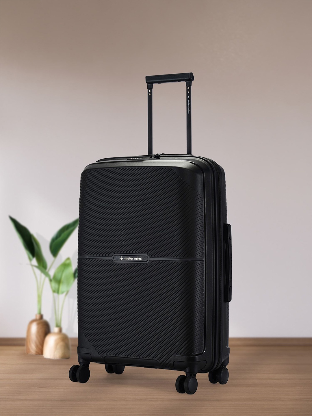 Nasher Miles Hawaii Polypropylene TSA Lock Medium Black Trolley Bag - 24 Inch (65 cm)
Nasher Miles Hawaii Polypropylene TSA Lock Medium Black Trolley Bag - 24 Inch (65 cm)