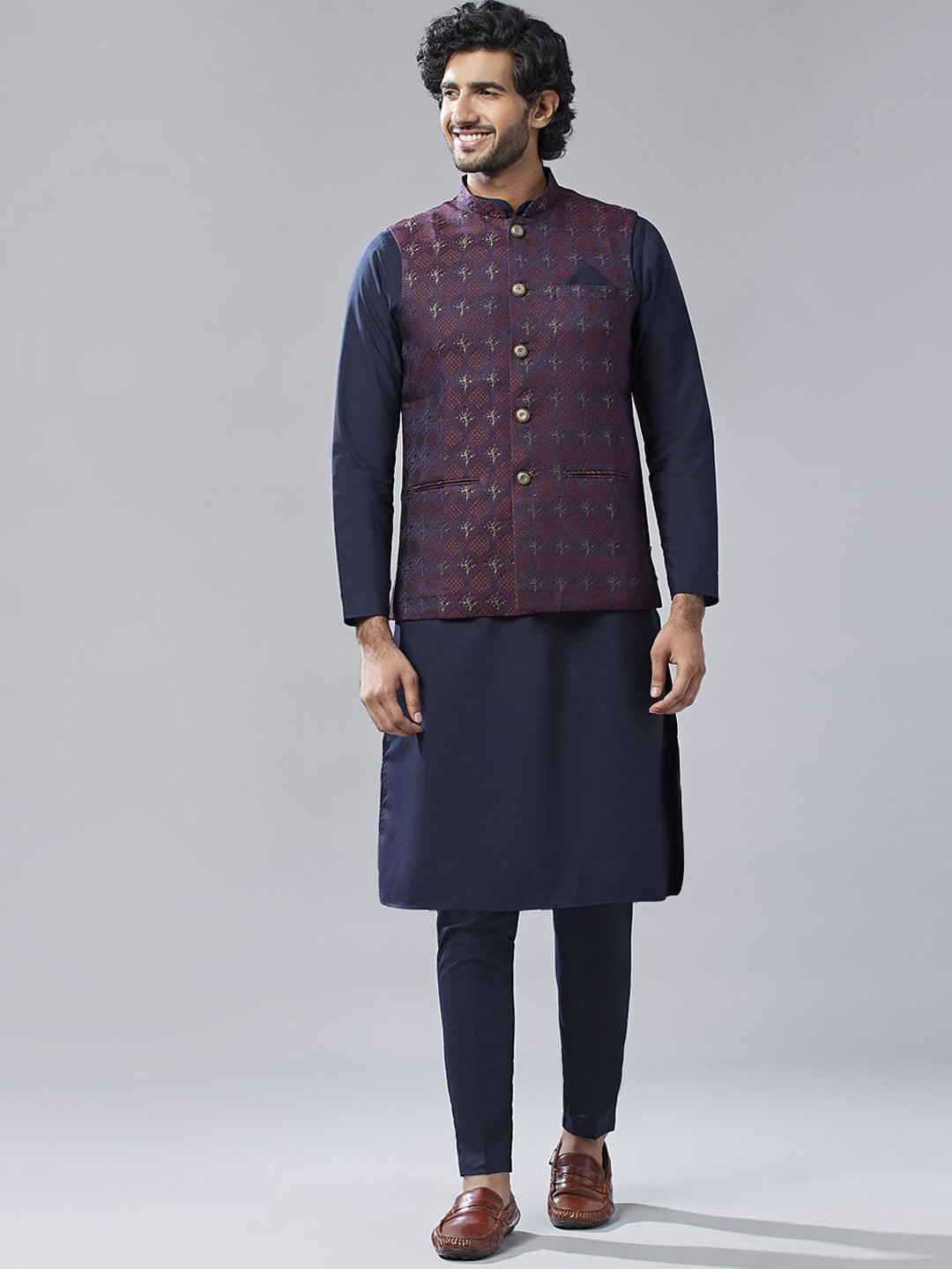 KISAH Mandarin Collar Long Sleeves Indigo Straight Kurta with Trousers & Nehru jacket, Maroon
KISAH Mandarin Collar Long Sleeves Indigo Straight Kurta with Trousers & Nehru jacket, Maroon