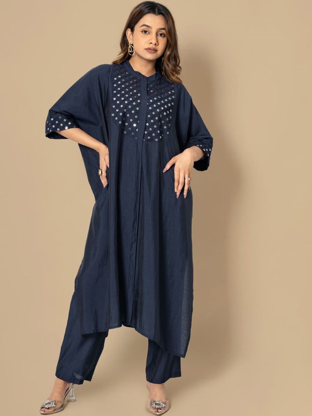 AUTUMN LANE Geometric Yoke Design Mirror Work Cotton Silk A-Line Kurta With Trouser, Blue
AUTUMN LANE Geometric Yoke Design Mirror Work Cotton Silk A-Line Kurta With Trouser, Blue