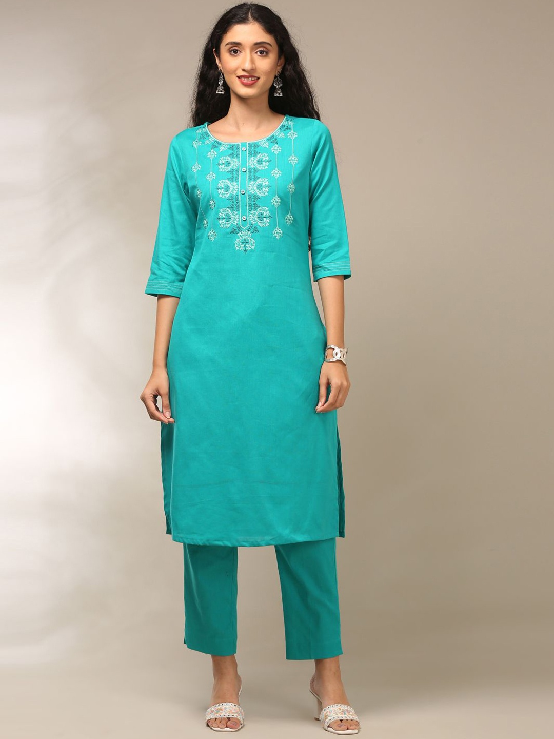 Alena Floral Embroidered Round Neck Thread Work Pure Cotton Straight Kurta With Trousers, Turquoise blue
Alena Floral Embroidered Round Neck Thread Work Pure Cotton Straight Kurta With Trousers, Turquoise blue