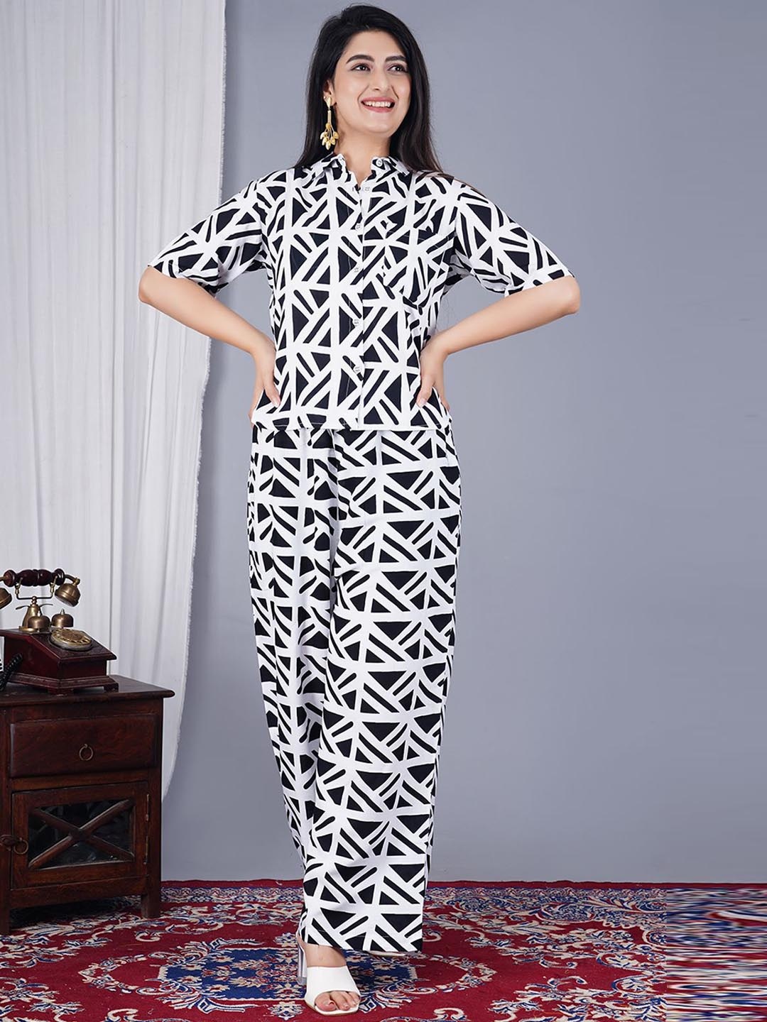 MANOJAVA Geometric Printed Short Sleeves Chest Pocket Detailing Shirt With Palazzos, Black
MANOJAVA Geometric Printed Short Sleeves Chest Pocket Detailing Shirt With Palazzos, Black