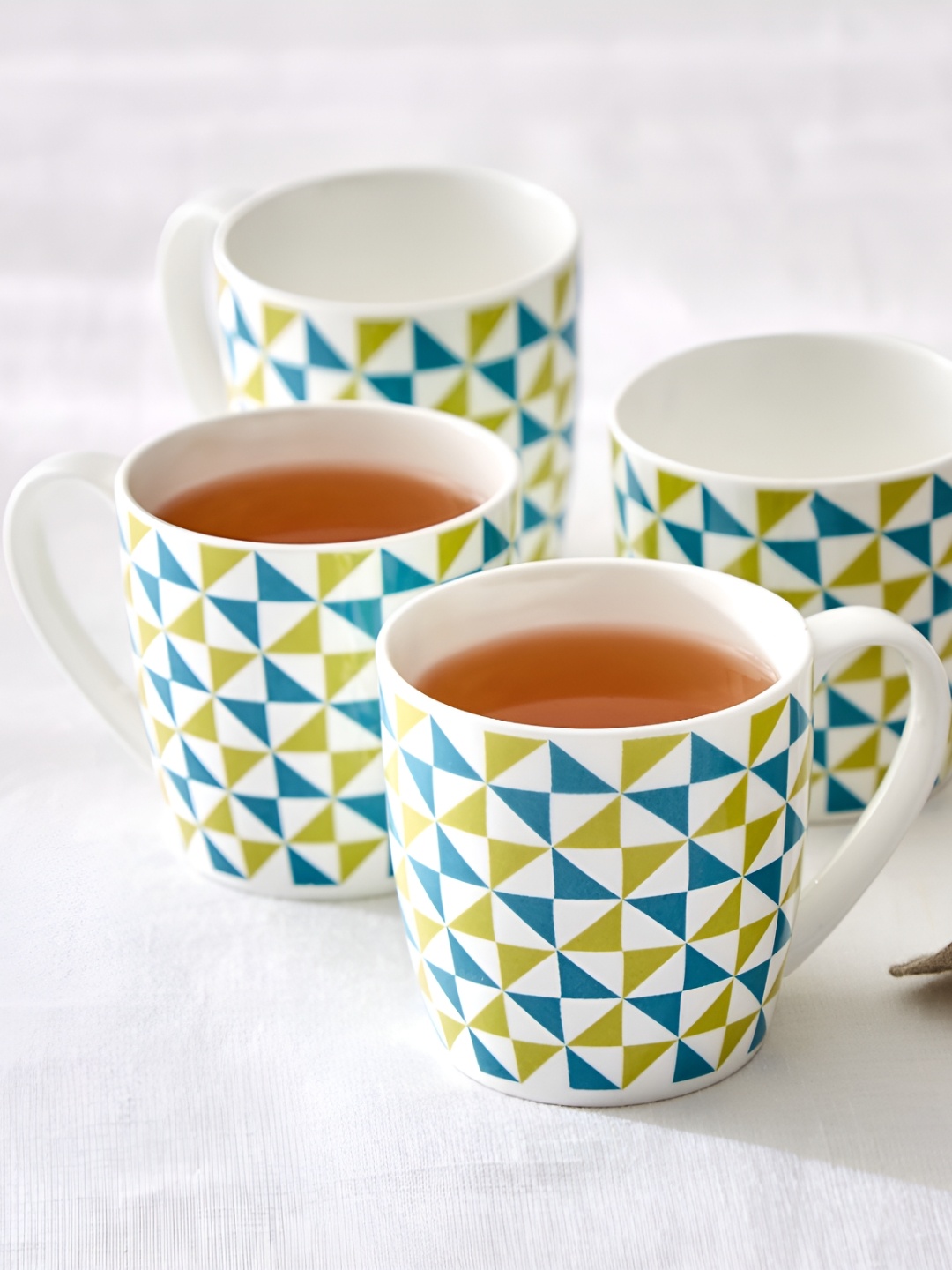 Home Centre Green & Blue Geometric Printed Bone China Glossy Mugs Set of Cups and Mugs
Home Centre Green & Blue Geometric Printed Bone China Glossy Mugs Set of Cups and Mugs