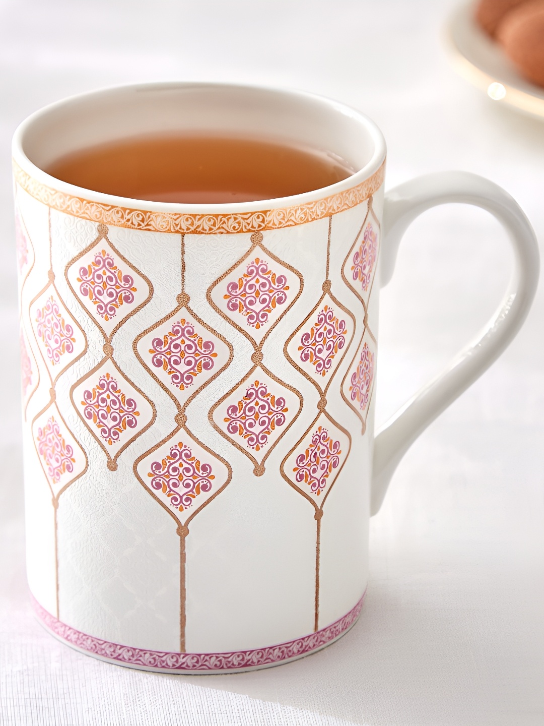 Home Centre White & Peach-Coloured Ethnic Motifs Printed Bone China Glossy Mugs Set of Cups and Mugs
Home Centre White & Peach-Coloured Ethnic Motifs Printed Bone China Glossy Mugs Set of Cups and Mugs