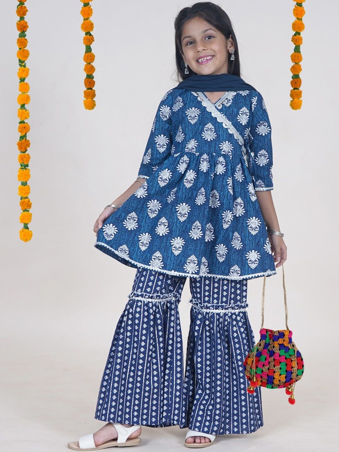 KiddoPanti Girls Ethnic Motifs Printed Pure Cotton A Line Kurta with Sharara & Dupatta, Blue
KiddoPanti Girls Ethnic Motifs Printed Pure Cotton A Line Kurta with Sharara & Dupatta, Blue