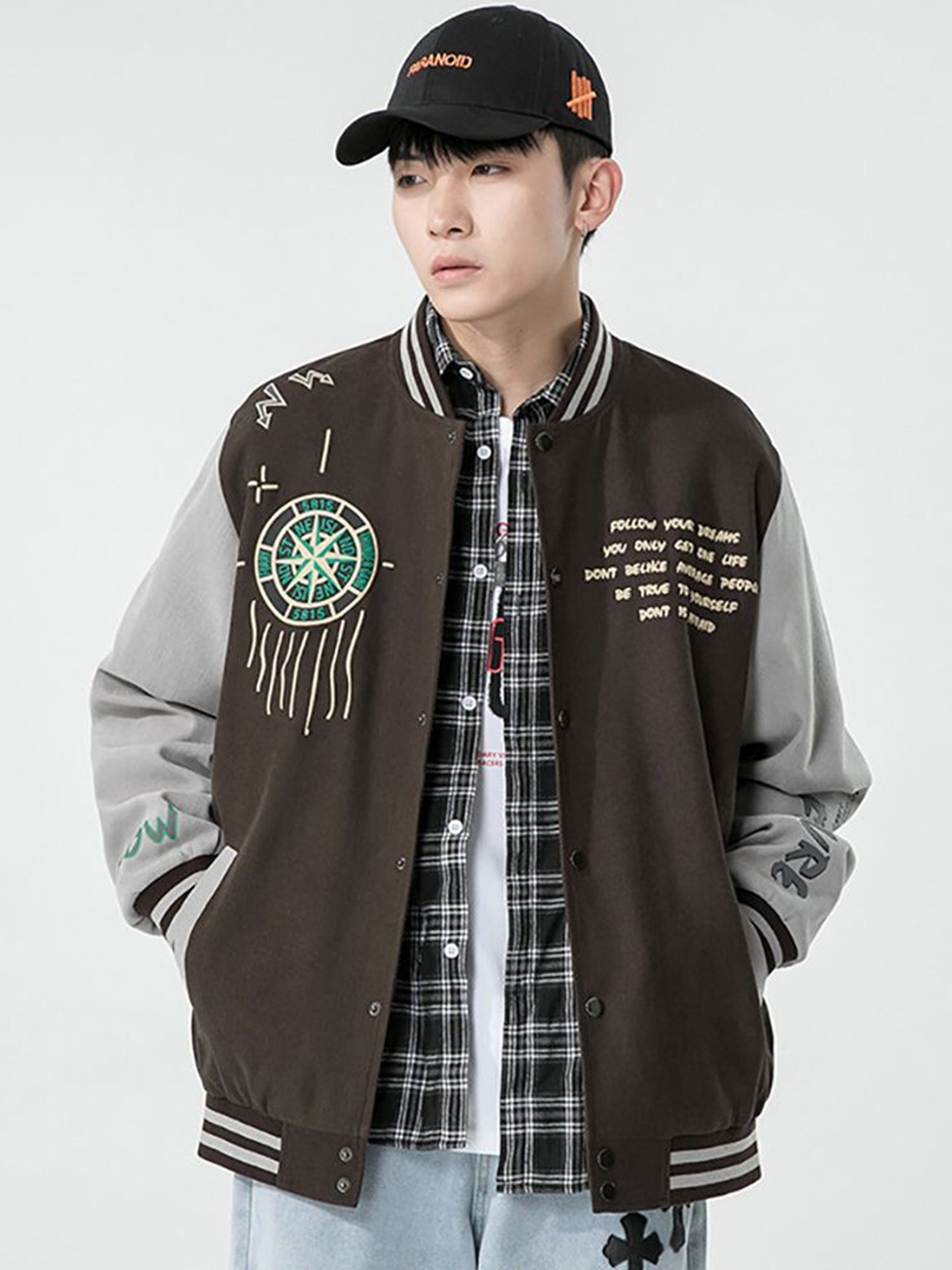 StyleCast x Revolte Men Stand Collar Typography Printed Casual Varsity Jacket, Coffee brown
StyleCast x Revolte Men Stand Collar Typography Printed Casual Varsity Jacket, Coffee brown