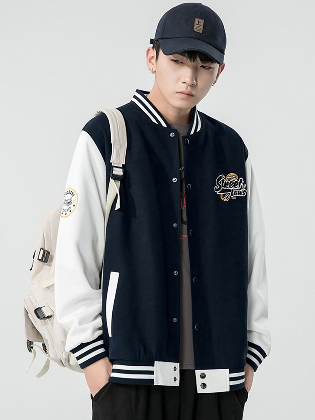 StyleCast x Revolte Men Stand Collar Typography Printed Casual Bomber Jacket, Navy blue
StyleCast x Revolte Men Stand Collar Typography Printed Casual Bomber Jacket, Navy blue