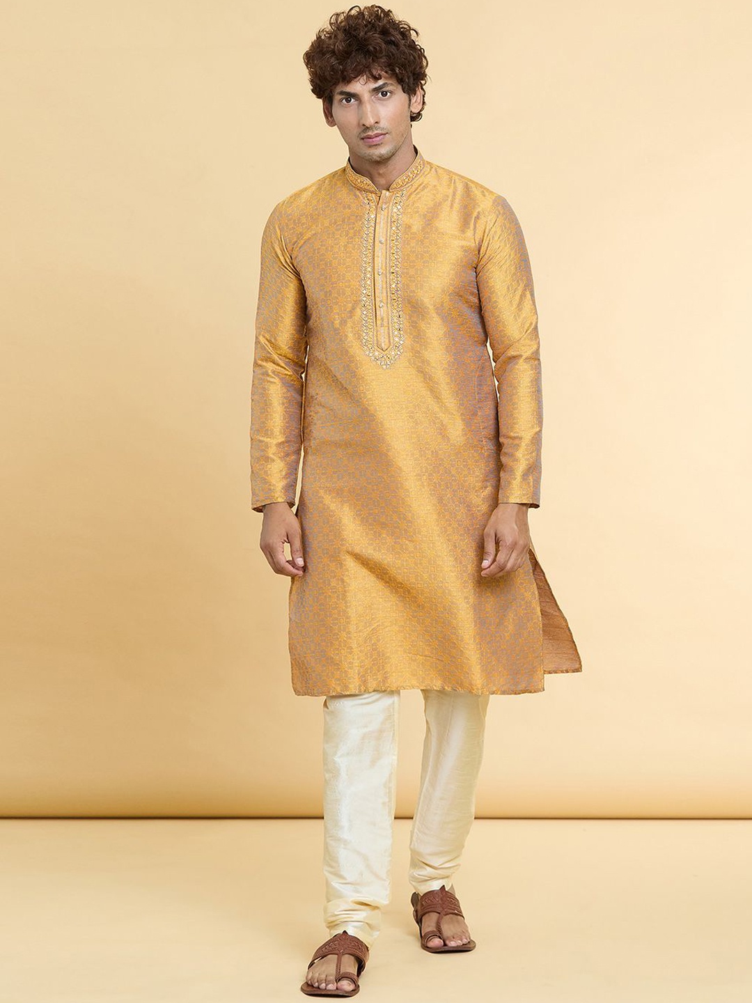 Arihant Rai Sinha Mandarin Collar Floral Woven Design Mirror Work Kurta with Churidar, Gold
Arihant Rai Sinha Mandarin Collar Floral Woven Design Mirror Work Kurta with Churidar, Gold