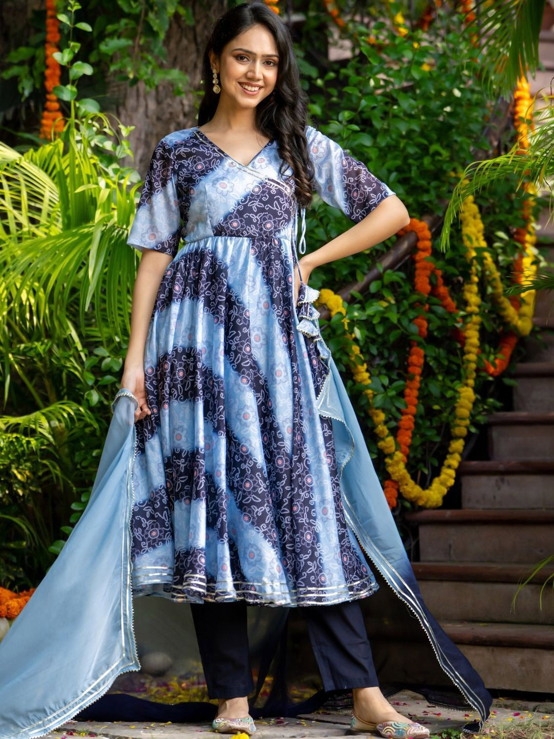 HOUSE OF JAMOTI Ethnic Motifs Printed Angrakha Anarkali Kurta with Trousers & Dupatta, Blue
HOUSE OF JAMOTI Ethnic Motifs Printed Angrakha Anarkali Kurta with Trousers & Dupatta, Blue