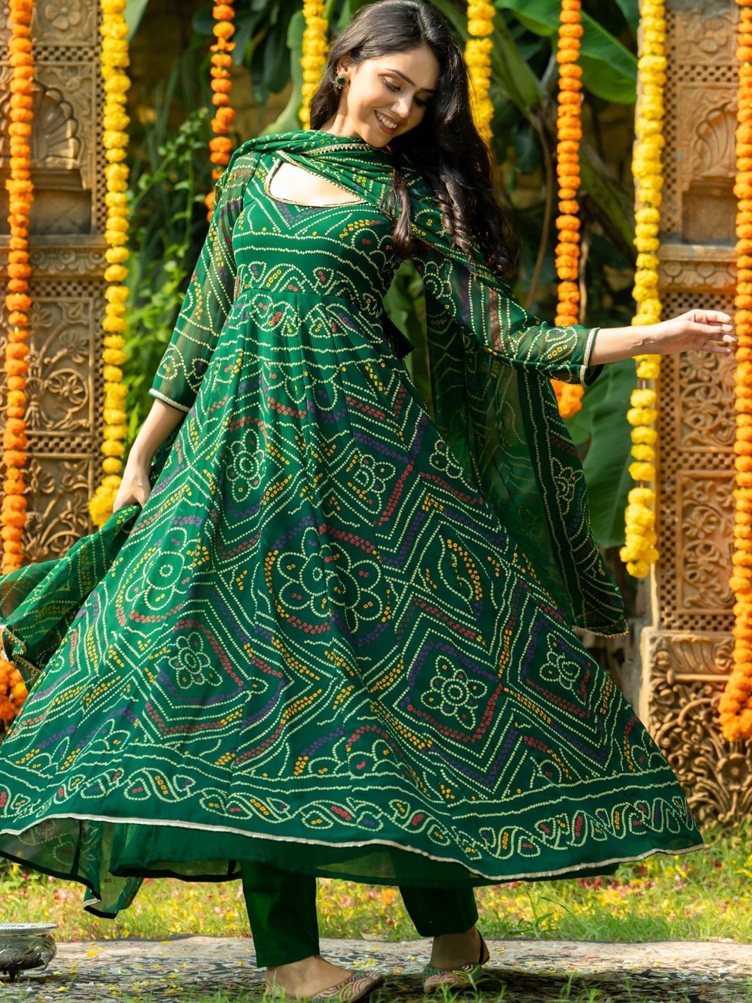 HOUSE OF JAMOTI Bandhani Printed Empire Georgette Kurta With Trousers & Dupatta, Green
HOUSE OF JAMOTI Bandhani Printed Empire Georgette Kurta With Trousers & Dupatta, Green