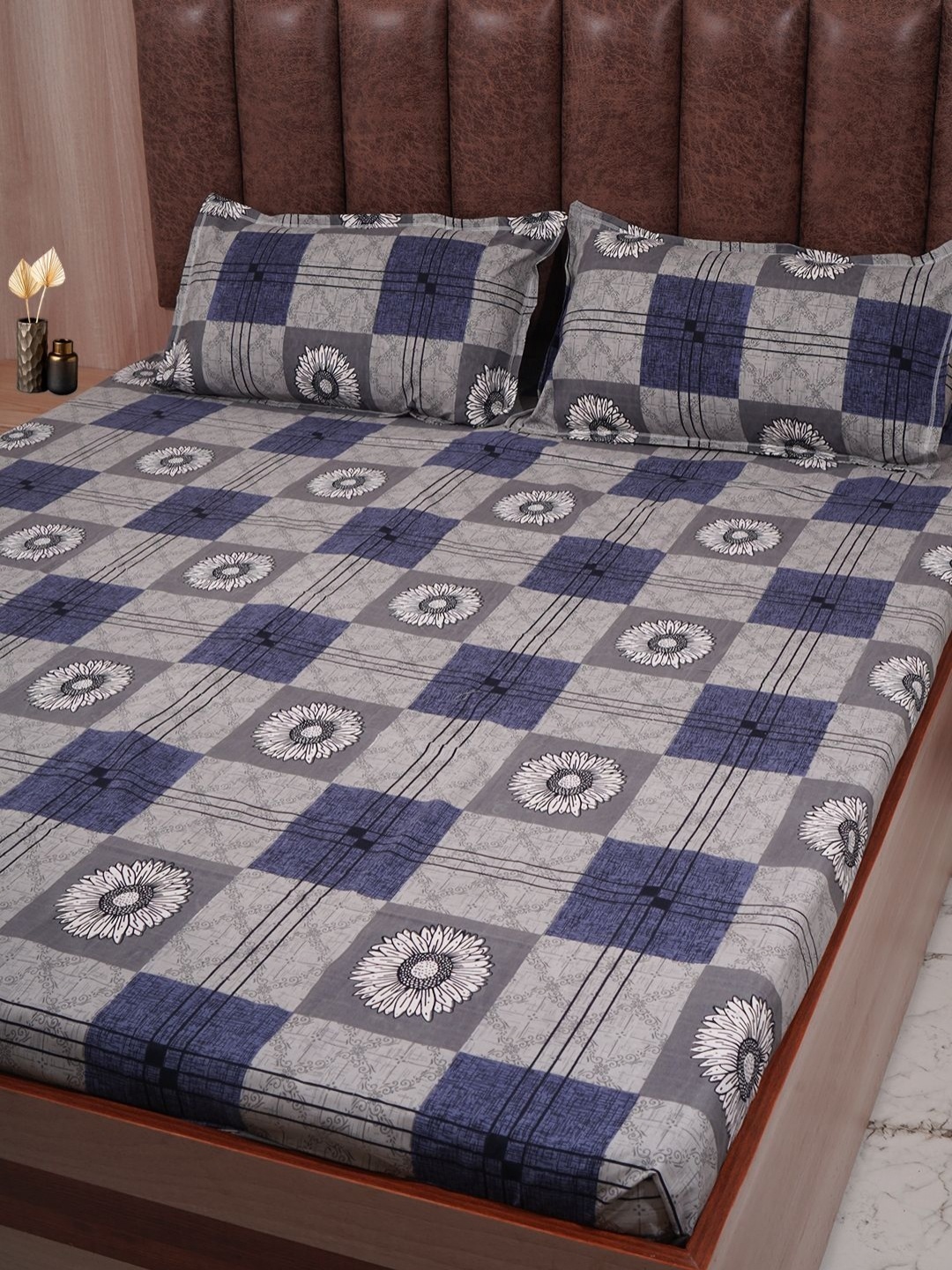 Adwitiya Blue & Grey Floral Printed 210 TC Double Queen Bedsheet with 2 Pillow Covers
Adwitiya Blue & Grey Floral Printed 210 TC Double Queen Bedsheet with 2 Pillow Covers