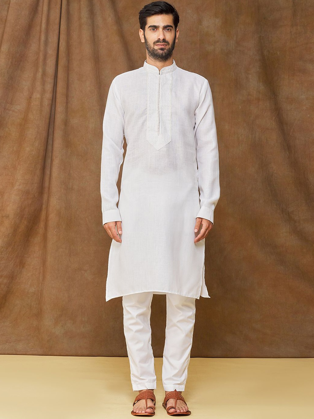 Samyukta Singhania Thread Work Mandarin Collar Linen Cotton Straight Kurta with Trousers, Off white
Samyukta Singhania Thread Work Mandarin Collar Linen Cotton Straight Kurta with Trousers, Off white