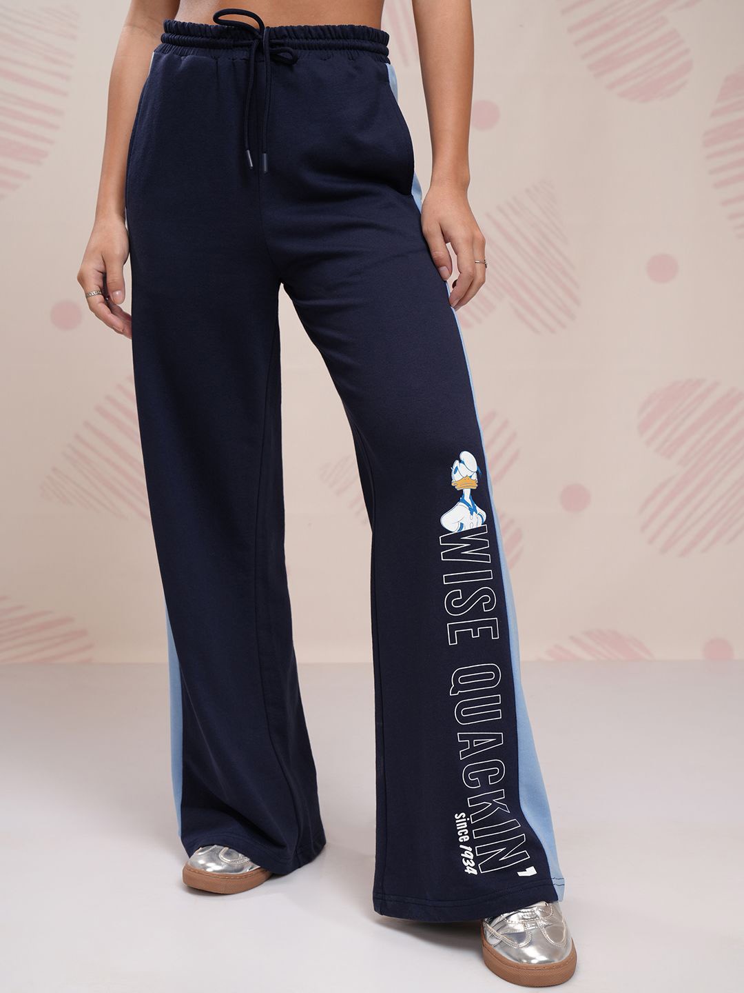 Tokyo Talkies Women Typography Printed Flared Flat Front High Rise Trousers, Navy blue
Tokyo Talkies Women Typography Printed Flared Flat Front High Rise Trousers, Navy blue