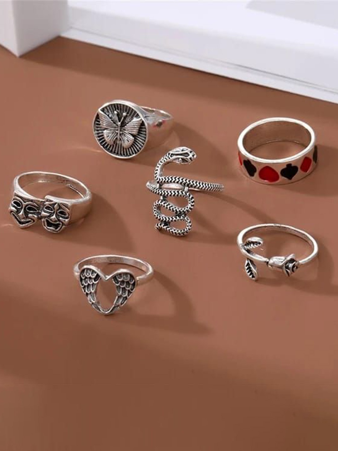 YU FASHIONS Set Of 6 Silver Plated Stainless Steel Snake Butterfly Heart Finger Rings
YU FASHIONS Set Of 6 Silver Plated Stainless Steel Snake Butterfly Heart Finger Rings