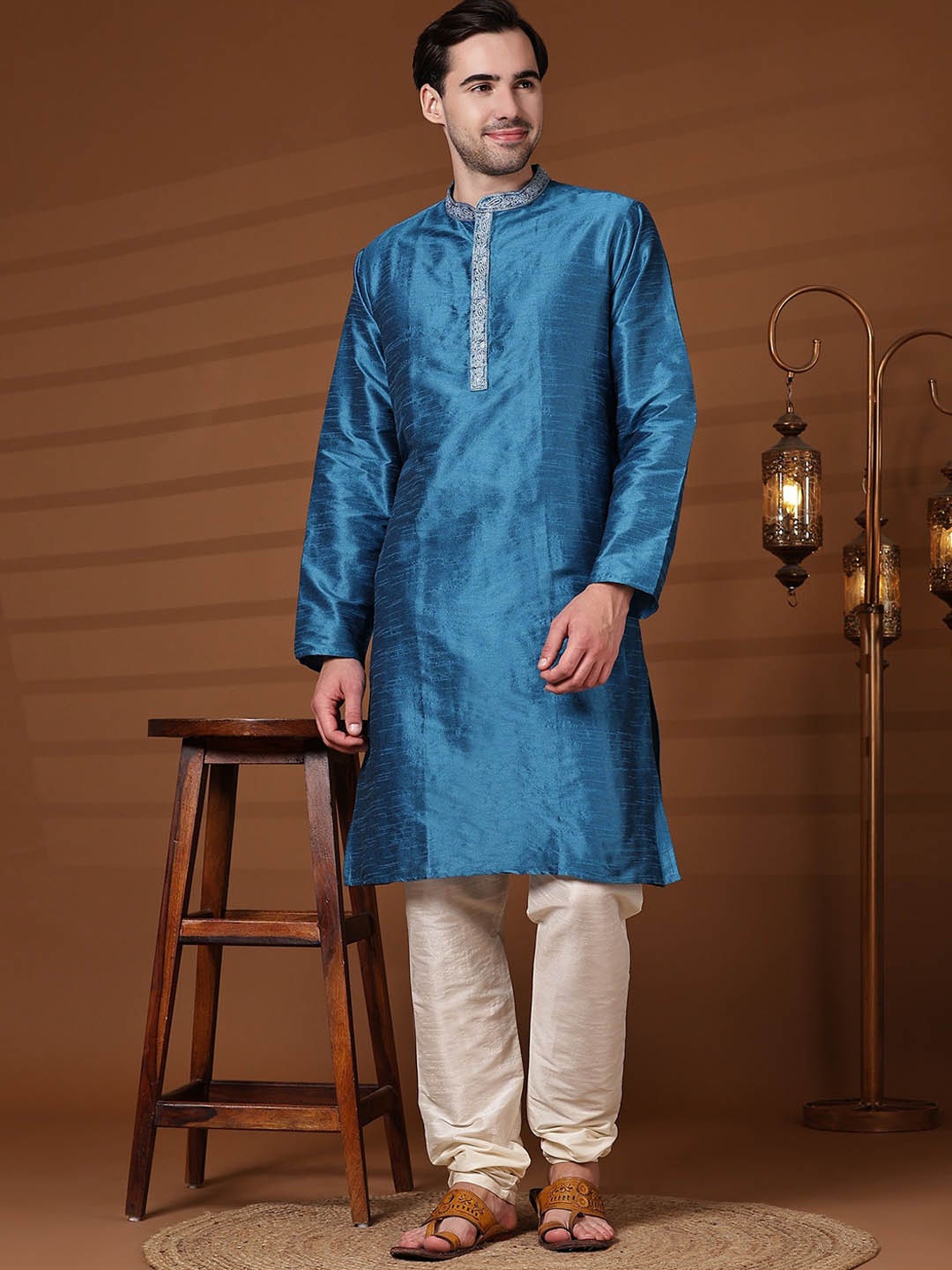 SKAVIJ Mandarin Collar Long Sleeves Thread Work Straight Kurta with Churidar, Turquoise blue
SKAVIJ Mandarin Collar Long Sleeves Thread Work Straight Kurta with Churidar, Turquoise blue