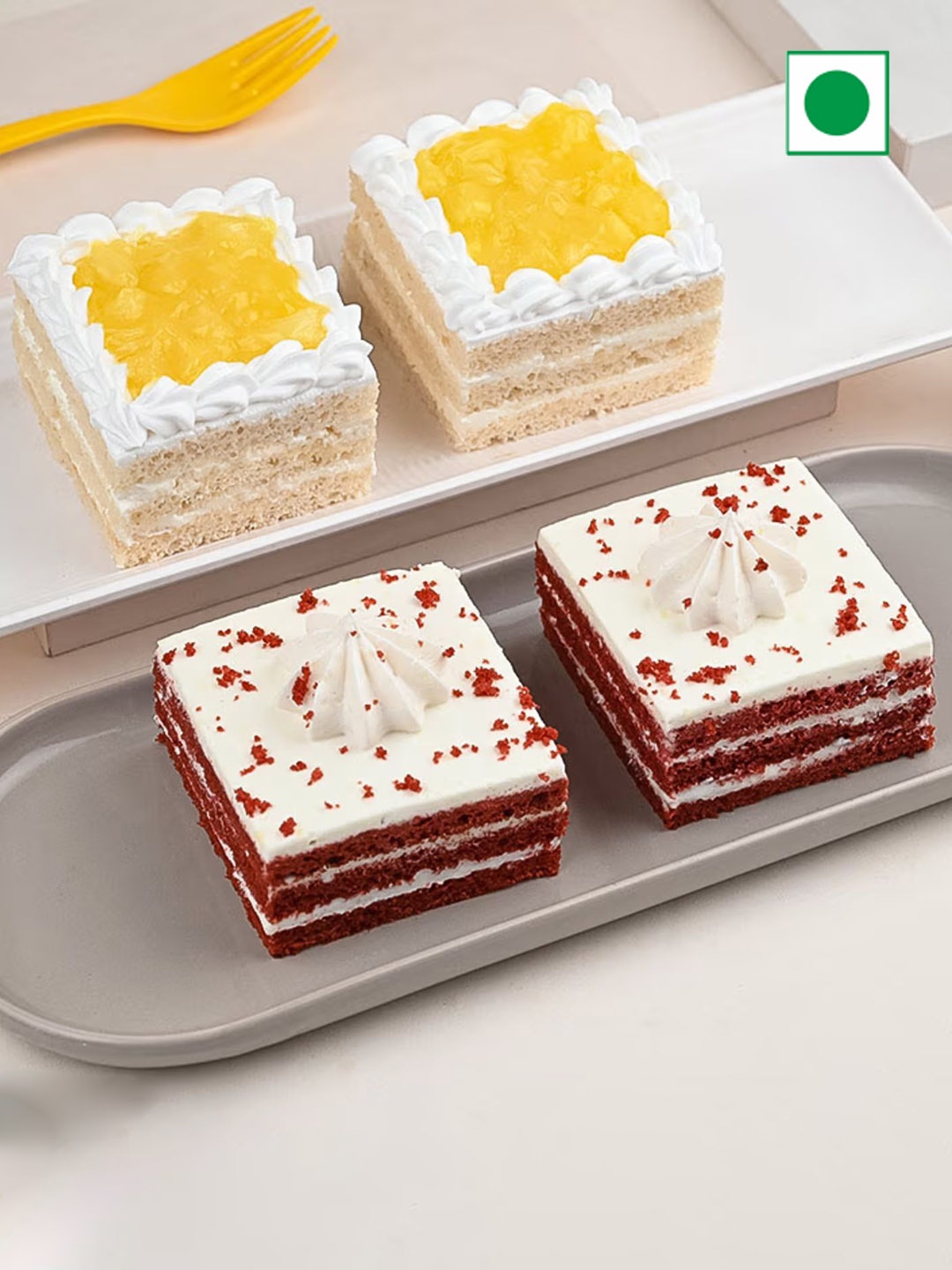 Floweraura 4Pcs Red Velvet & Pineapple Flavour Eggless Square Pastries Cakes- 500g
Floweraura 4Pcs Red Velvet & Pineapple Flavour Eggless Square Pastries Cakes- 500g