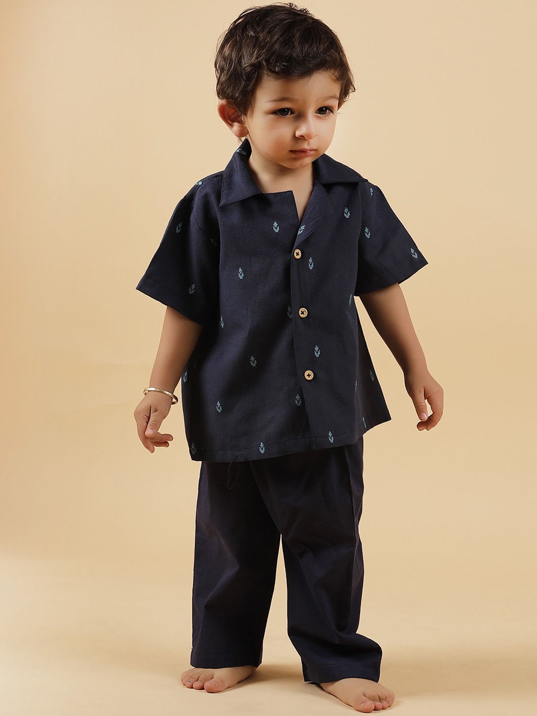 TJORI Boys Ethnic Motifs Printed Cuban Collar Pure Cotton Casual Shirt With Trousers, Blue
TJORI Boys Ethnic Motifs Printed Cuban Collar Pure Cotton Casual Shirt With Trousers, Blue