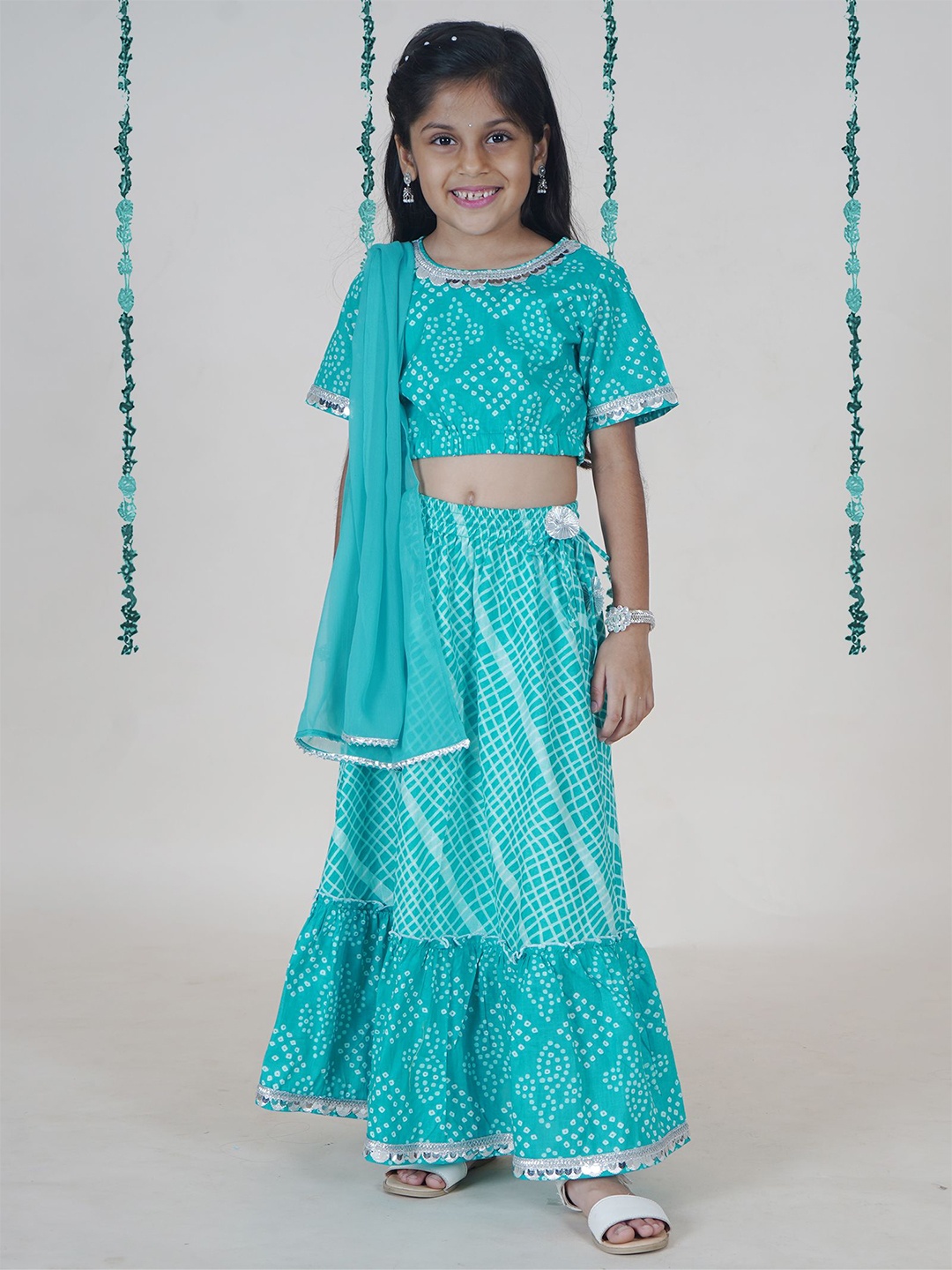 KiddoPanti Girls Bandhani Printed Ready to Wear Lehenga & Blouse With Dupatta, Turquoise blue
KiddoPanti Girls Bandhani Printed Ready to Wear Lehenga & Blouse With Dupatta, Turquoise blue