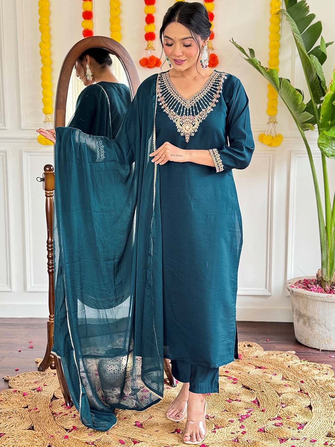 KALINI Floral Embroidered V-Neck Chanderi Silk Straight Kurta with Trousers & With Dupatta, Teal
KALINI Floral Embroidered V-Neck Chanderi Silk Straight Kurta with Trousers & With Dupatta, Teal
